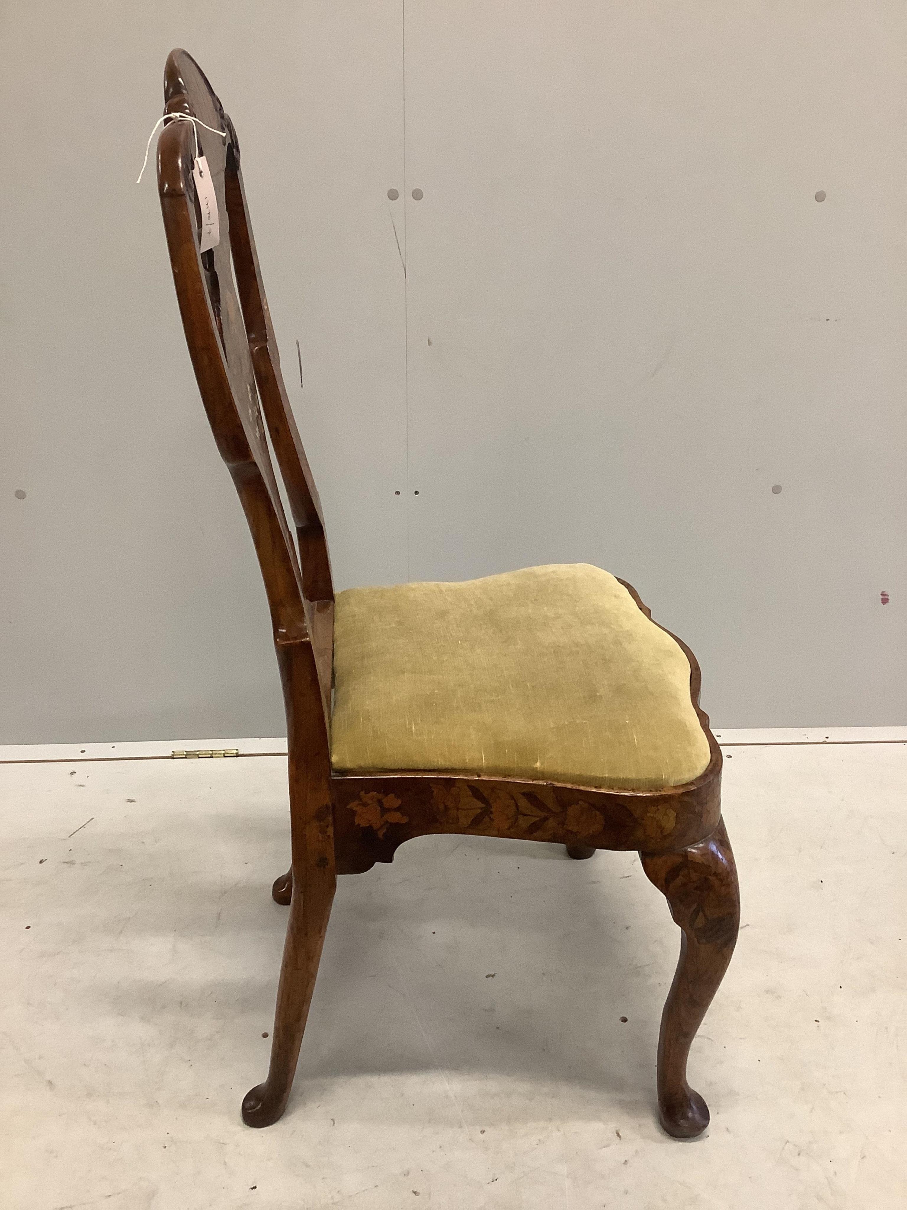 An 18th century Dutch marquetry inlaid dining chair, width 51cm, depth 41cm, height 106cm. Condition - good